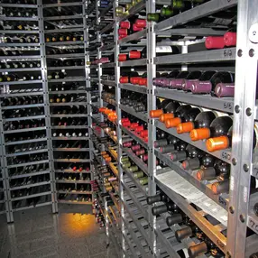 Deluxe Metal Wine Racks featuring a contemporary design with bottles on cables